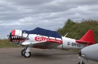 G-BRVG @ EGSV - Parked outside the row of hangars at Old Buckenham - by Chris Holtby