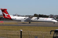 VH-QOJ @ YSSY - taxi from 3-4R - by Bill Mallinson