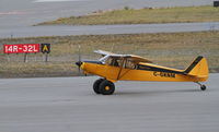 C-GKNM @ CYXY - Taxiing at Whitehorse, Yukon. - by Murray Lundberg