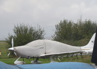 N147LD @ EGTR - Parked and covered at Elstree - by Chris Holtby