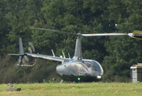 G-ICEL @ EGTR - Robinson R66 doing training circuits at its base at Elstree - by Chris Holtby