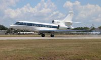 N67EA @ KORL - Falcon 7X - by Florida Metal