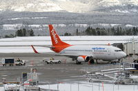 C-FANF @ CYXY - At the jetway at Whitehorse, Yukon. - by Murray Lundberg