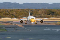 9V-OFG @ RJCC - “Kama Scootra”  about to cross from Rwy 01R to 01L at Sapporo after arriving in the autumn evening as TR892 from Taipei. - by Arjun Sarup