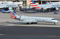 N701SK @ KPHX - Skywest operating this CL700 on behalf of American Eagle - by FerryPNL