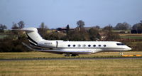 N200ES @ EGGW - taxying for dep from runway 26 - by Michael Vickers