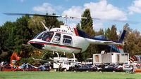 VH-AZH - Port side view of Heli-Aust Bell 206B JetRanger III VH-AZH Cn 3075 hovering near Lake Burley Griffin and Old Parliament House Canberra during Canberra Week festivities on 17Mar1997-Canberra Day. Several Bell JetRangers flew many 5 min Joyflights that day. - by Walnaus47
