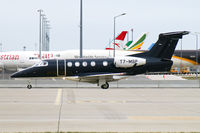 T7-MSP @ LOWW - private Embraer 505 Phenom 300 - by Thomas Ramgraber