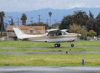 N6441C @ KRHV - Locally based 1980 Cessna 210N landing at Reid Hillview Airport, San Jose, CA. - by Chris Leipelt