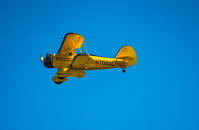 N7020L @ PDK - Beautiful WACO bi-plane that offers rides to customers.  Jet blue skies today with its nice contrasting yellow airframe.  Awesome!  This was shot a Peachtree-Dekalb Airport (KPDK) just north of Atlanta, Georgia. - by Gene - of Genesphotographyfactory