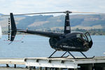 ZK-HAD - Rear Stbd view of Black livery Robinson R44 II ZK-HAD Cn 11986, parked on a pontoon at Rotorua New Zealand on 12Apr2010.