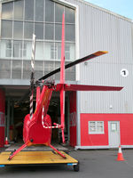 ZK-IBJ @ NZQW - Rear view of Helipro Robinson R44 Raven ZK-IBJ Cn 1008 parked on a ground handling platform at NZQW Wellington - Queens Wharf Heliport NZ - on 14Apr2010.