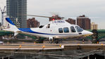 G-REXC @ EGLW - Landing at the London Heliport - by Tim Lowe
