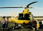 VH-NSO @ YCOM - Front view of parked ‘people magnet’ NSCA Bell 412EP VH-NSO Cn 33089 (Code 11), at Cooma Airport YCOM NSW during the 'Snow Opening' Airshow on 11May1986. (Helo with NSCA 08MAR85 - 29MAY89 - later Sold to USA as N167EH.)