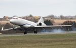 B-605D @ EGGW - ZYB Lily Global 6000 smoking the tyres on landing at LTN - ex N788ZJ airframe