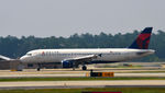 N323US @ KATL - Landing Atlanta - by Ronald Barker