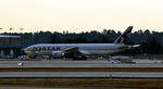 A7-BFE @ KATL - Loading cargo  Atlanta - by Ronald Barker