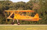 N64587 @ C77 - Stearman