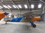 G-CIIC @ EGBT - Piper Super Cub in the hangar at Turweston, Bucks. - by Chris Holtby