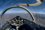 VH-GCG @ YPFT - Airborne Cockpit view from Canberra Gliding Club Let L-13 Blanik Glider VH-GCG Cn 025424 over Cooma NSW (launched from Polo Flat YPFT) on 30Mar1980. The canopy developed a crack, which grew Like Topsy - too late to ‘stop drill’ the crack in the Perspex!