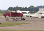 G-CWFT @ EGSU - Parked and covered at Duxford Airfield - by Chris Holtby