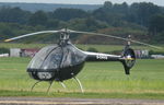 G-ONVG @ EGHO - Parked at Thruxton Airfield, Hants - by Chris Holtby