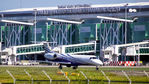 PK-RJX @ WALL - A terminal building and an Embraer PK-RJX - by Mas Kentungs