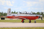 166248 @ KPGD - US Navy T-6 Texan II (166248) from Training Air Wing 5 at Naval Air Station Whiting Field arrives at Punta Gorda Airport for the Florida International Air Show - by James Donten