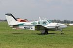 N111FD @ KOSH - Beech C55 - by Mark Pasqualino