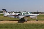 N21KK @ KOSH - Beech A36 - by Mark Pasqualino