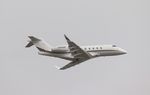 N794QS @ KSRQ - Challenger 300