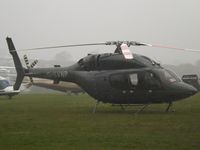 G-SVNP @ EGBC - Ex M-INOR, Parked up at Cheltenham Heliapd. - by James Lloyds