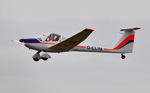 G-CLIM @ EGFH - Resident Dimona motor-glider touch and go on Runway 22. - by Roger Winser