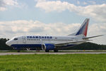 EI-DTV @ UUDD - Transaero - by Stuart Scollon