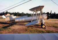 N61310 @ NA - Photo of Stearman N61310 at the hangar. The plane was owned by Franklin Nichols dba Nichols Dusting and Spraying Service in Hosston, LA. - by William L. Mitchell III