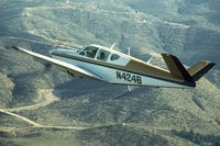 N424B - Over southern California in the late 70s. - by Paul Spurlock