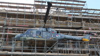 272 - Perched on the scaffolding surrounding Heveningham Hall, Suffolk, UK. - by G. Crisp