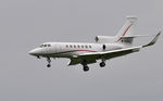 M-ODUS @ EGFH - Visiting Falcon bizjet finals to land Runway 22. - by Roger Winser