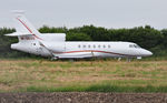 M-ODUS @ EGFH - Visiting bizjet back tracking Runway 22.