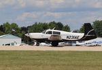 N231AE @ KOSH - Mooney M20K - by Mark Pasqualino