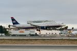 N152UW @ KLAX - US Airways Airbus A321-211, N152UW landing on 25L LAX - by Mark Kalfas