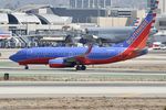 N426WN @ KLAX - Southwest Boeing 737-7H4 N426WN arriving at LAX - by Mark Kalfas