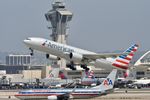 N783AN @ KLAX - American N783AN Boeing 777-223 departing 25R LAX - by Mark Kalfas