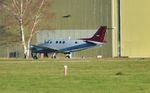 M-POWR @ EGHH - Parked at distance - by John Coates