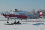 G-YAKF @ EGSU - Parked at Duxford in the snow.