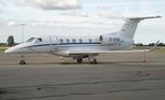 D-CHIC @ EKRK - Embraer 505 Phenom 300 D-CHIC seen parked on the apron at Roskilde Airport with a 'Brakes Off' sign in the cockpit side window. - by Jan Lundsteen-Jensen