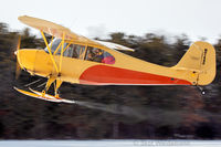 N81542 @ C37 - Aeronca N81542 hopping rides at the EAA Chapter 431 Groundhof Chili Skit Fly-In Feb 4, 2023. - by Skot Weidemann