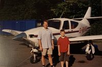 G-BHSE @ EGTB - Former owner Hamish Harding (of recent Titan submersible fame) and his cousin Robert Livingston Evans at Wycombe Aerodrome in 2003 - by Unknown