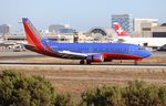 N389SW @ KLAX - SWA 733 canyon blue zx in from OAK - by Florida Metal
