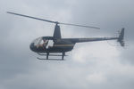 N4439U @ WS17 - Robinson R44 II, c/n: 12890. Helicopter rides. AirVenture 2023 - by Timothy Aanerud